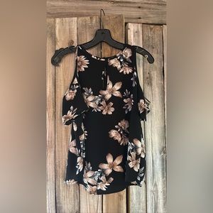 Cold shoulder top floral blouse.